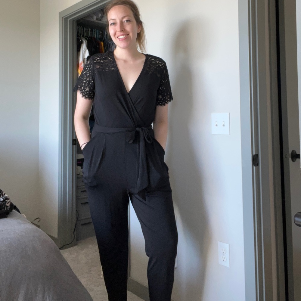H&M black jump suit with lace sleeves and shoulders